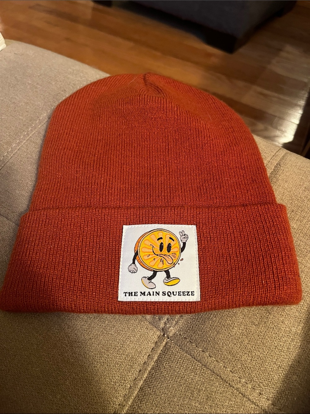 Orange Knit Beanie with 'The Main Squeeze' Patch